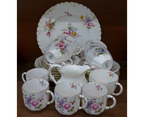 Royal Crown Derby Derby Posies china, six trios, four coffee cups and saucers, one cream and a dinner plate