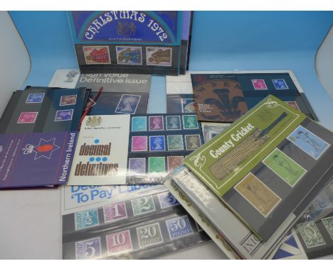 A collection of thirty-two British Post Office mint stamps