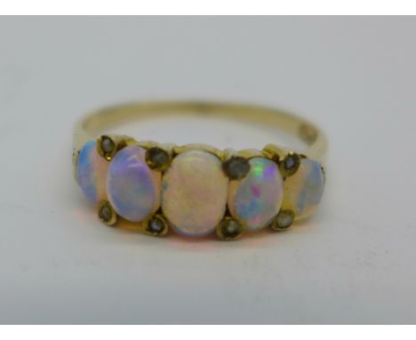 A 9ct gold and five stone opal ring, 1.8g, P