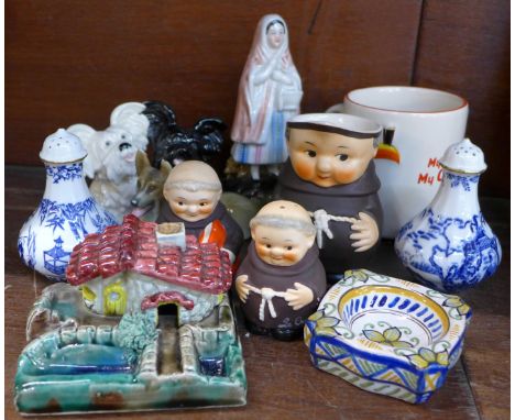 A collection of novelty figures, a pair of Royal Crown Derby peppers, Goebel cruets, etc., (11)