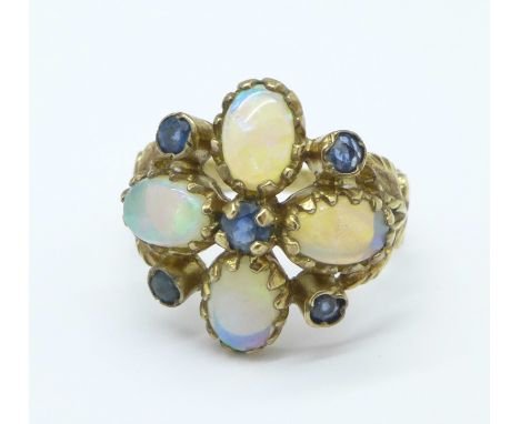 A 9ct gold, opal and sapphire ring, 3.2g, I