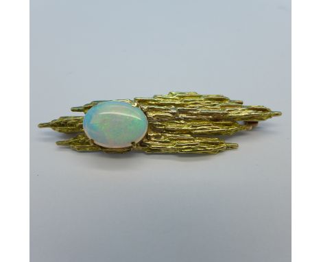 A 9ct gold and opal brooch, 8.2g, 57mm
