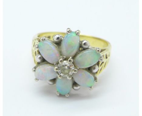 An 18ct gold, opal and diamond flower ring, 4g, I