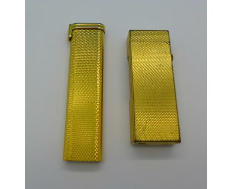 A Dunhill lighter and one other