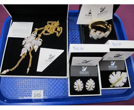 Swarovski; A Large Gilt Metal Leaf Necklace, in original box; Together with Matching Hinged Bangle, boxed; A Swarovski Matchi