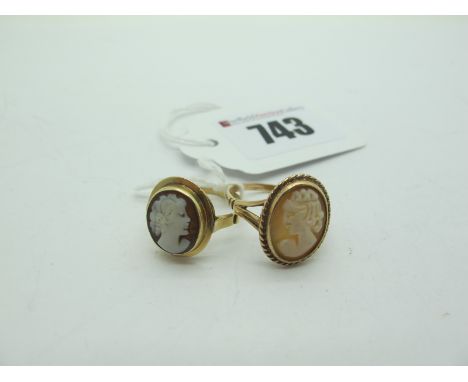 An Oval Cameo Dress Ring, stamped "9ct" (finger size O); together with another cameo ring. (2) 