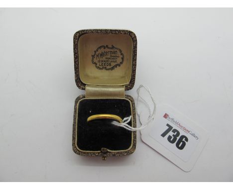 A Plain Wedding Band, indistinctly stamped "22" (finger size P) (3.6grams), in a vintage ring box. 