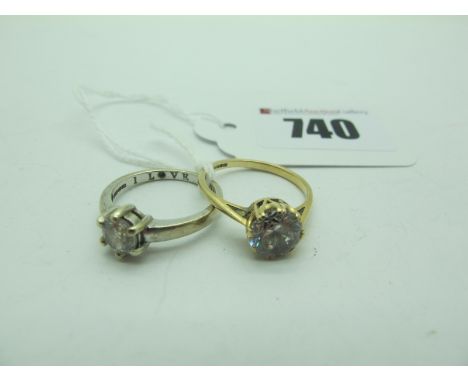 A CZ Single Stone Dress Ring, stamped "585" (finger size O) (2.4grams); together with another single stone dress ring, stampe