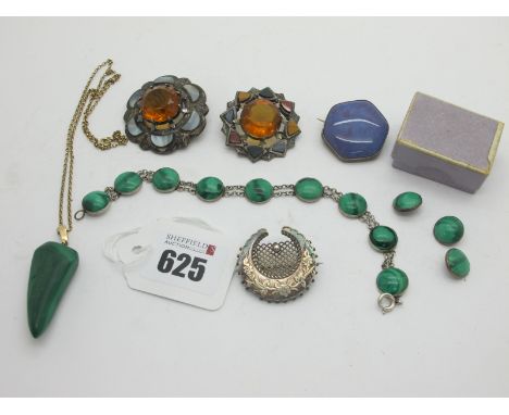 A Ruskin Ceramic Panel Brooch, Victorian Scottish hardstone inset brooches, a malachite pendant, on a 9ct gold chain, a malac