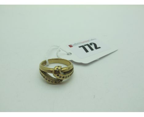 A 9ct Gold Dress Ring, of abstract design, with inset highlights (finger size O) (4.5grams). 