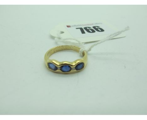 A Modern Diamond Set Ring, rubover set, stamped "18C" (finger size N) (3.7grams). 