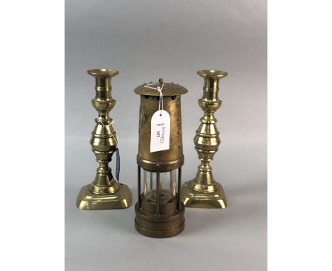 BRASS OIL LAMP AND A PAIR OF BRASS CANDLESTICKS, the lamp with S. Thomas &amp; Williams, 24.5cm high
