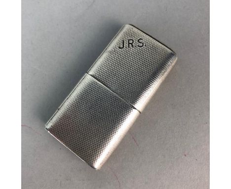 SILVER ENGINE TURNED CIGARETTE LIGHTER - THE HOWITT, circa 1940