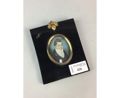 MINIATURE REGENCY PORTRAIT OF A GENTLEMAN, 6cm x 4.5cm, framed and under glass
