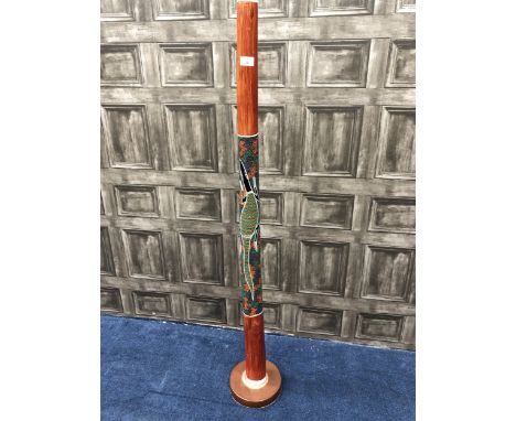 AUSTRALIAN DIDGERIDOO, on stand, 131cm long