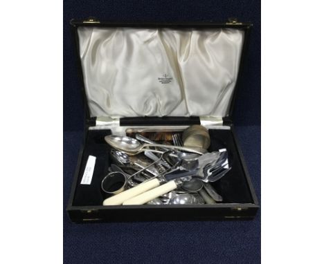 LOT OF SILVER PLAYED FLATWARE, including napkin rings, hairbrush, spoons and other plated items