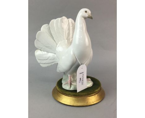 LLADRO FIGURE OF A TURTLE DOVE, with mark to underside, 20cm high, along with a Lladro figure of a polar bear and a Lladro fi