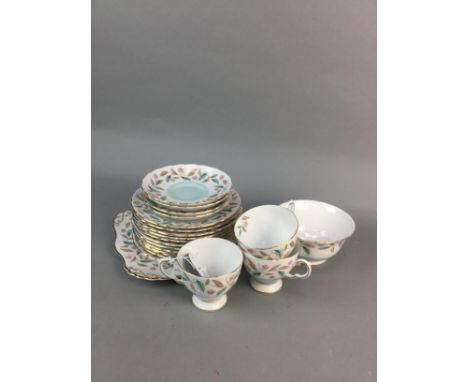 TUSCAN FINE ENGLISH BONE CHINA TEA SERVICE, comprising eleven cups, twelve saucers, twelve side plates, sugar bowl and sandwi