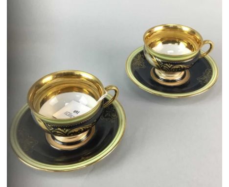 PAIR OF CONTINENTAL CABINET CUPS AND SAUCERS, transfer printed with scenes of classical maidens, the cups 7cm high