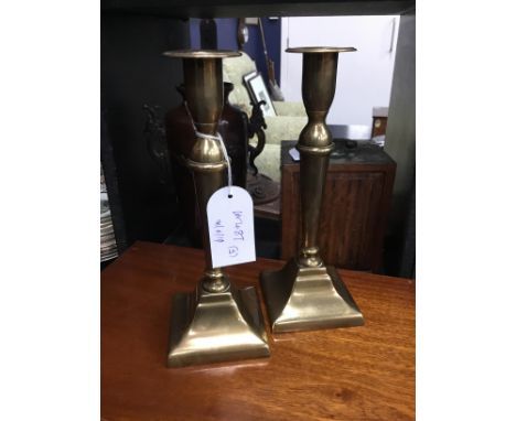 TWO PAIRS OF BRASS CANDLESTICKS and a small aneroid barometer with thermometer (5)