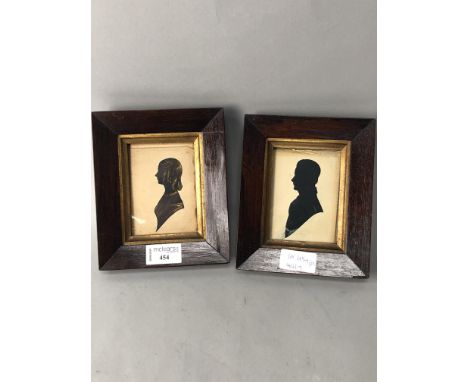 PAIR OF VICTORIAN PROFILE SILHOUETTE PORTRAIT MINIATURES, of a young lady and gentleman, in rosewood frames, each 17cm x 14cm