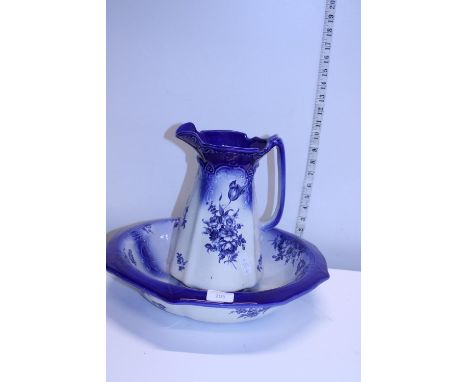 A blue and white ceramic jug and basin set, shipping unavailable 