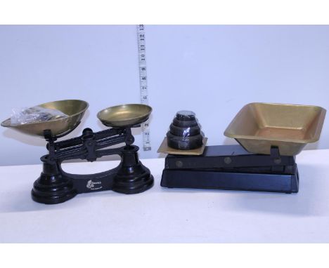 Two sets of kitchen scales with weights 