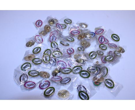 A job lot of assorted enamel motorbike badges 