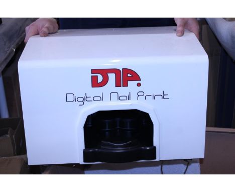 A boxed digital nail art printer (unchecked).  No postage 