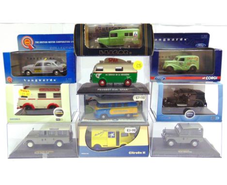 TEN 1/43 SCALE LIGHT COMMERCIAL VEHICLES  including taxis, most mint or near mint, each boxed.