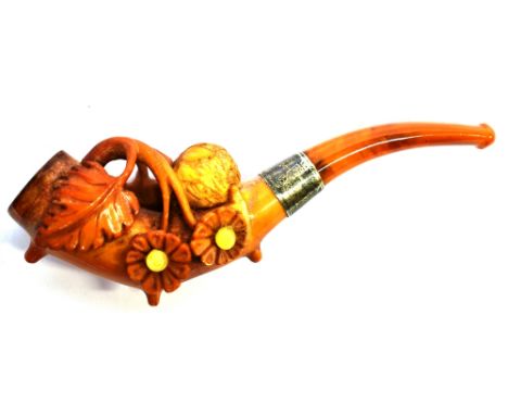 A MEERSCHAUM CHEROOT HOLDER OR SMALL PIPE  the bowl carved with a strawberry plant, with a silver collar and an amber mouthpi
