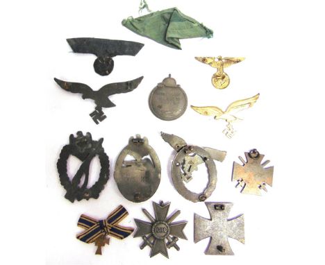 A COLLECTION OF SECOND WORLD WAR GERMAN THIRD REICH MEDALS, BADGES &amp; INSIGNIA including a War Merit Cross; Tank Assault B