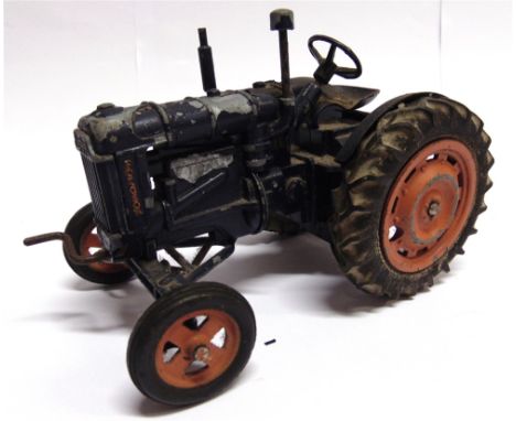 A CHAD VALLEY FORDSON MAJOR TRACTOR  dark blue with dark orange wheels, playworn, 17.5cm long, unboxed.