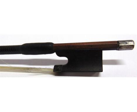 A W.E.HILL &amp; SONS VIOLIN BOW the stick round, with a silver adjuster and mounts and an ebony frog, the octagonal terminal