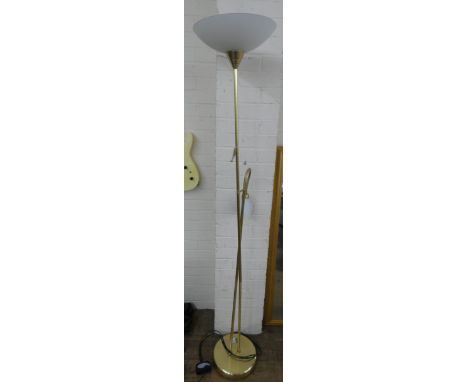 A brass uplighter lamp standard with adjustable reading section 