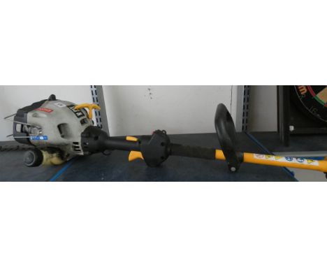 A Ryobi petrol engine strimmer 