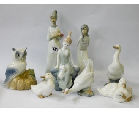 A collection of 8 figures to include three ladies, geese, an owl and Nao ducks 