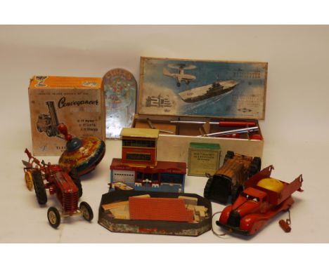 Pre and Post-War Play-Worn Tin and Other Toys Including, Marx red tin pull-along trunk with  a bell, Triang No 2 tractor, Les