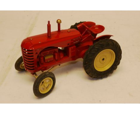 Moko Lesney Tractor, A Moko Lesney Massey Harris 745 D tractor in red livery with rubber tyres marked Lesney some chips to pa