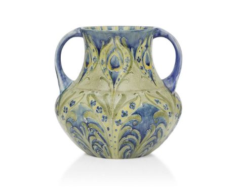William Moorcroft (1872-1945), a Peacock Feather pattern twin-handled ceramic vase retailed by Liberty & Co       c.1900, sig