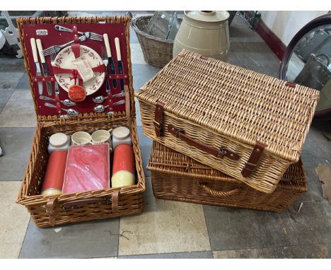 A Sirram picnic set and two wicker baskets 