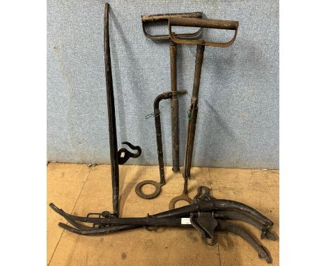 Two pairs horse hames, two vintage stirrup water pumps and a coal scuttle 