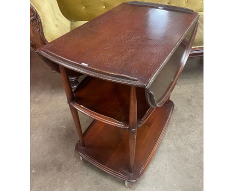 An Ercol Golden Dawn elm and beech Windsor trolley 