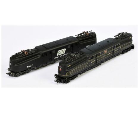 AHM HO Gauge GG1 Locomotives - Penn Central in Black with white logo and numbering 4892 (Missing one coupling) &amp; Pennsylv