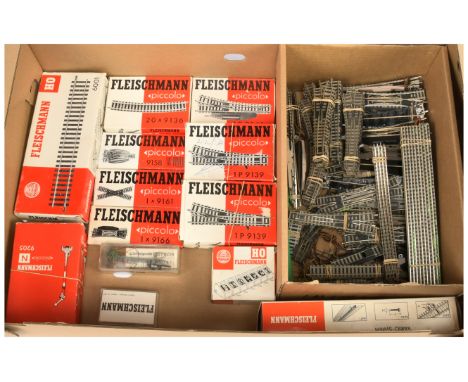 Fleischmann N Gauge Track and Points - A large assortment of manual and electrically operated points plus track. Plus two pac