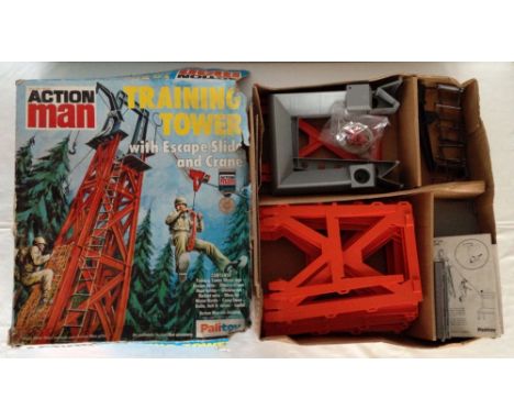 A boxed Action Man Training Tower with escape slide & crane.