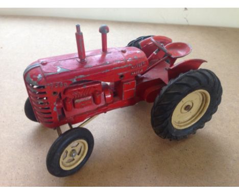 A large scale Lesney Massey Harris 745 D tractor with steering.