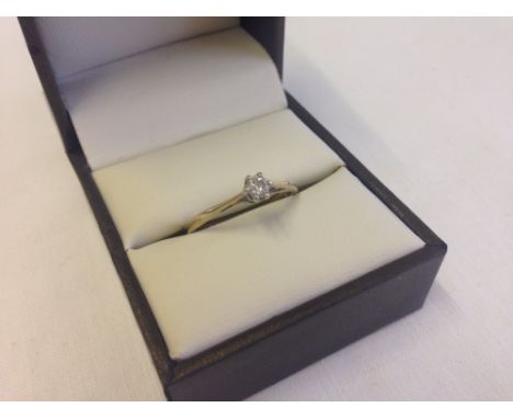 A 9ct gold diamond solitaire ring, size O1/2.