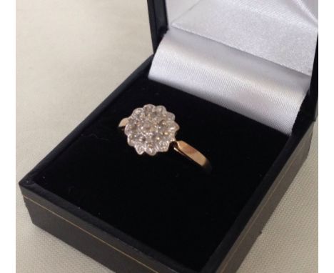 A ladies 9ct gold diamond cluster dress ring, total diamond weight 0.05ct. Size R