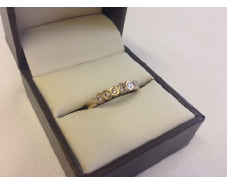 9ct gold diamond 1/2 eternity ring set with 7 diamonds, size M.